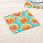 Oranje plakken op blauw kartonnen onderzetters (Schuin)