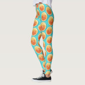 Oranje plakken op blauw leggings (Links)