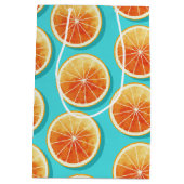 Oranje plakken op blauw medium cadeauzakje (Achterkant)