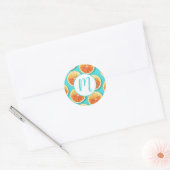 Oranje plakken op blauw ronde sticker (Envelop)