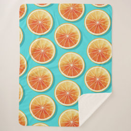 Oranje plakken op blauw sherpa deken