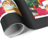 Oranje poes in kerstmuts inpakpapier (Rol Hoek)