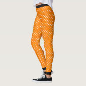 ORANJE POLKA DOT LEGGINGS MET ZWART (Links)