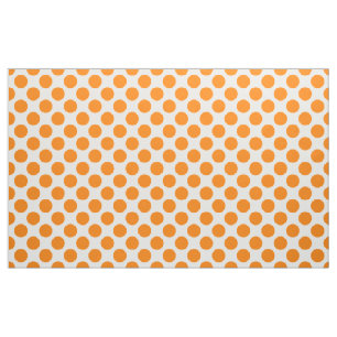 Oranje polka stippen op wit stof