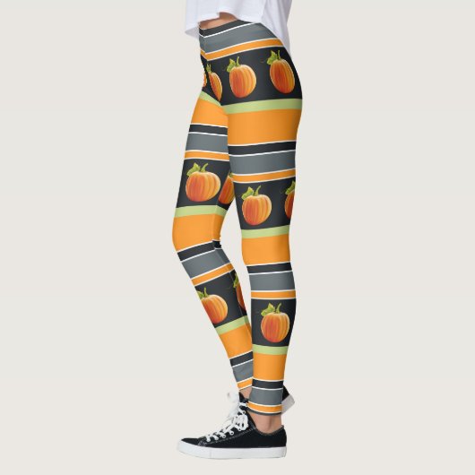 Oranje pompoen op trilling leggings (Links)
