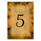 Oranje pompoenen met gevleugelde weddenschappen kaart (Voorkant)