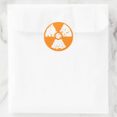 Oranje radioactief symbool ronde sticker (Tas)