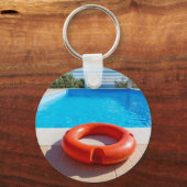 Oranje reddingsboei in blauw zwembad sleutelhanger (Voorkant)