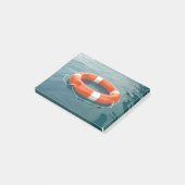 Oranje reddingsboei in de oceaan post-it® notes (Schuin)