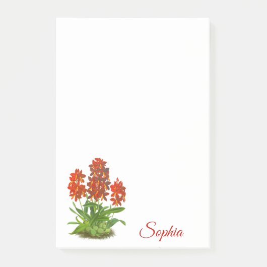 Oranje rode orchidee bloem na het opschrift post-it® notes (Voorkant)