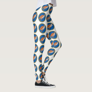Oranje schildpad zwemmen met een gouden lijst leggings