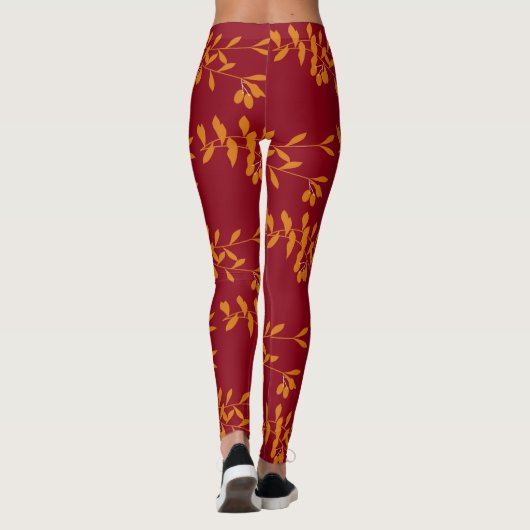 Oranje silhouetbladeren op rood leggings (Achterkant)