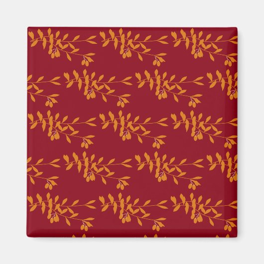 Oranje silhouetbladeren op rood magneet (Voorkant)