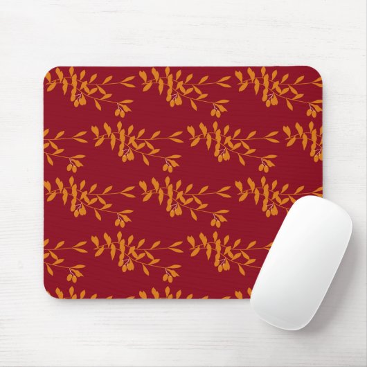 Oranje silhouetbladeren op rood muismat (Met muis)