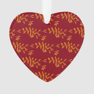 Oranje silhouetbladeren op rood ornament
