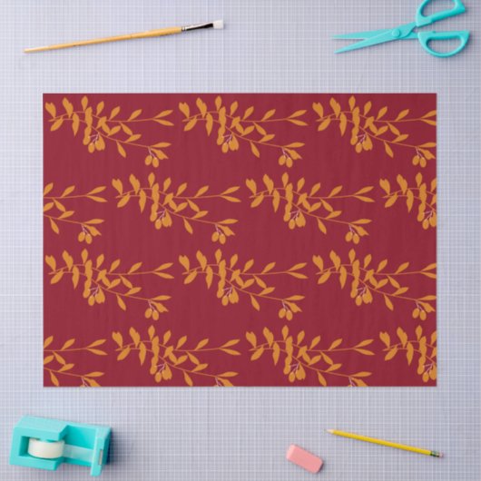 Oranje silhouetbladeren op rood tissuepapier (Craft)