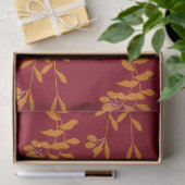 Oranje silhouetbladeren op rood tissuepapier (Geschenk)