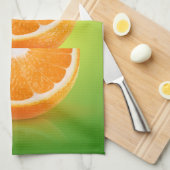 Oranje stukken op groen theedoek (Quarter Fold)