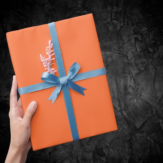 Oranje vaste kleuren verbranden cadeaupapier