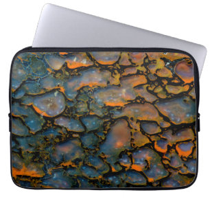 Oranje versteende dinosaurusbot laptop sleeve