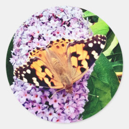 Oranje vlinder ronde sticker