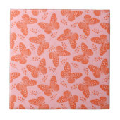 Oranje vlinderpatroon op roze achtergrond tegeltje (Voorkant)