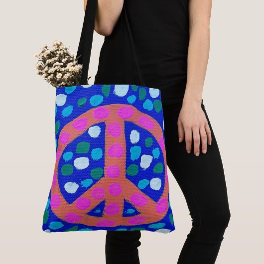 Oranje vredesbord op blauw tote bag (Dichtbij)