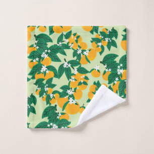 oranje vruchten met groene achtergrondnaadjes washandje
