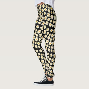 Oranje wit zwart madeliefjes bloempatroon leggings