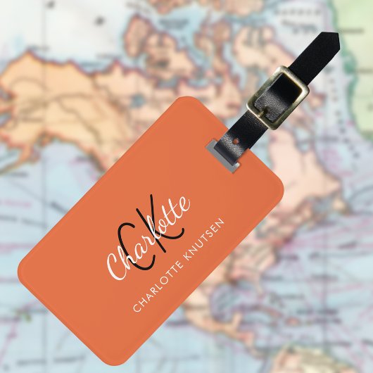 Oranje witte monogrammen bagagelabel