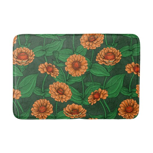 Oranje Zinnia bloemen, groene bladeren op donkergr Badmat (Voorkant)