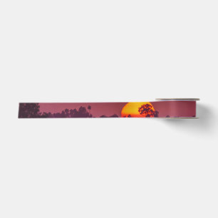 Oranje zon op roze Paarse lucht Foto Satijnen Lint