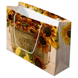 Oranje zonnebloemen in tin mandje groot cadeauzakje