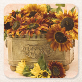 Oranje zonnebloemen in tin mandje kartonnen onderzetters