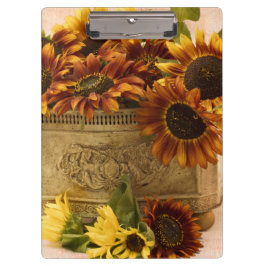 Oranje zonnebloemen in tin mandje klembord