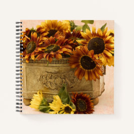 Oranje zonnebloemen in tin mandje notitieboek