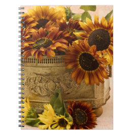 Oranje zonnebloemen in tin mandje notitieboek