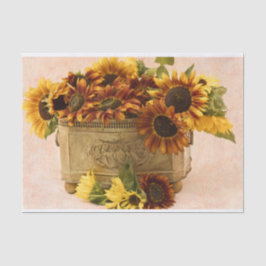 Oranje zonnebloemen in tin mandje tissuepapier