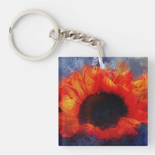 Oranje zonnebloempitten sleutelhanger (voorkant)