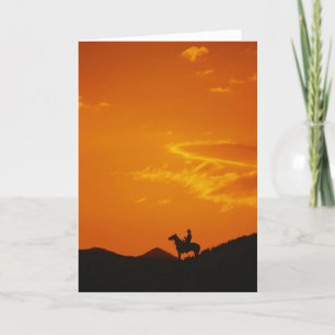 Oranje zonsondergang met Cowboy Silhouette Kaart