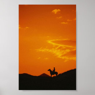 Oranje zonsondergang met Cowboy Silhouette Poster
