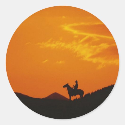 Oranje zonsondergang met Cowboy Silhouette Ronde Sticker (Voorkant)
