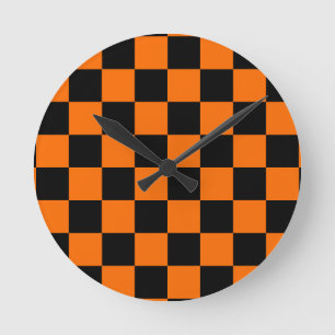 Oranje zwart geruit controlepatroon ronde klok