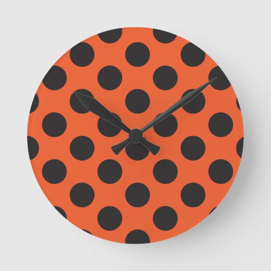 Oranje + zwart puntpatroon moderne bug ronde klok (Voorkant)