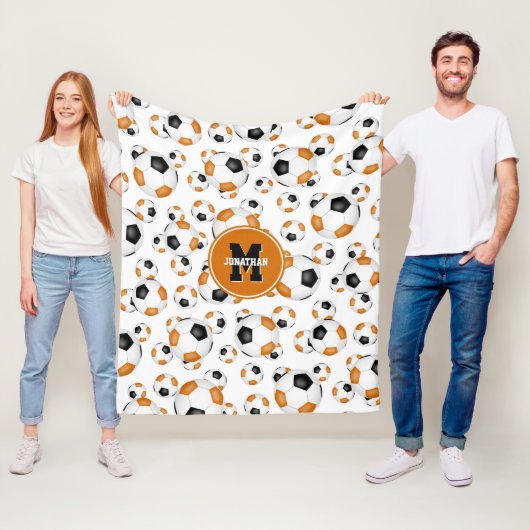 oranje zwart team kleuren jongens voetbal fleece deken (In situ)