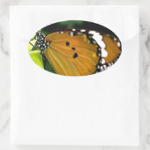 Oranje, zwarte en witte vlinder op leder ovale sticker (Tas)