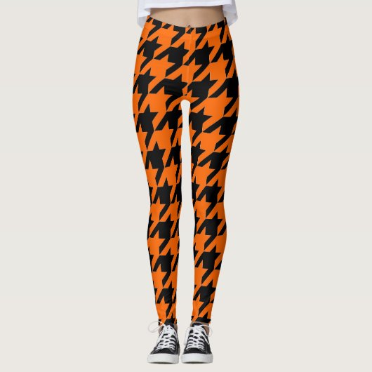 Oranje zwarte honden tandenpatroon leggings (Voorkant)