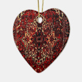 Orientaal tapeontwerp in donkerrood keramisch ornament (Links)