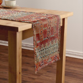 Orientaal tapeontwerp in het oranje korte tafelloper (Voorbeeld)