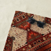 Orientaal tapijtpatroon in sinaasappel en room strandlaken (In situ)